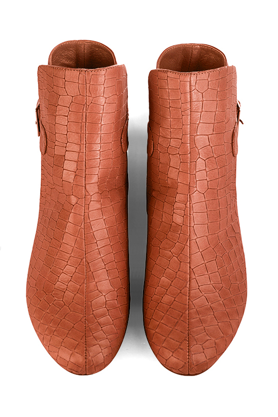 Terracotta orange women's ankle boots with buckles at the back. Round toe. Flat block heels. Top view - Florence KOOIJMAN